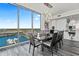 Modern dining room with water views and sleek furniture at 5120 Marina Way # 14002, Tampa, FL 33611