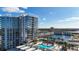 Luxury condo building with resort-style pool and deck area at 5120 Marina Way # 14002, Tampa, FL 33611