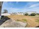 View of the backyard from the home's back patio at 5330 Dean Dairy Rd, Zephyrhills, FL 33541