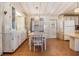 Kitchen dining area with built-in cabinetry and wood flooring at 5330 Dean Dairy Rd, Zephyrhills, FL 33541