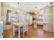 Combined kitchen and dining area with wood flooring at 5330 Dean Dairy Rd, Zephyrhills, FL 33541