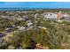 Aerial shot of a lot showing proximity to the water and commercial areas at 620 Scotland St, Dunedin, FL 34698