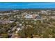 An aerial view of property lines highlighting the area near local commercial developments at 620 Scotland St, Dunedin, FL 34698