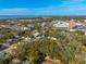 An aerial view shows the property's location near the water and local amenities at 620 Scotland St, Dunedin, FL 34698