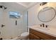 Modern bathroom featuring glass shower, decorative tile floor and contemporary vanity with vessel sink at 6905 122Nd Dr, Largo, FL 33773