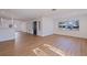 Bright living room with hardwood floors, lots of light and fresh white paint at 6905 122Nd Dr, Largo, FL 33773