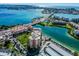 Aerial view of waterfront condo building and surrounding area at 7400 Sun Island S Dr # 207, South Pasadena, FL 33707