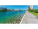 Enjoy the view from this waterfront walkway along the canal at 7400 Sun Island S Dr # 207, South Pasadena, FL 33707