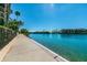 Scenic walkway along the calm waters of a canal at 7400 Sun Island S Dr # 207, South Pasadena, FL 33707