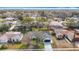 Aerial view of home, showcasing the well-maintained lawn and landscaping at 7800 Willow Brook Ct, Hudson, FL 34667