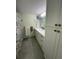 Updated bathroom with tile floors, a single vanity, and a shower/tub combo at 860 Virginia St # 303, Dunedin, FL 34698