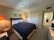 Bedroom with neutral walls, and a spacious closet at 860 Virginia St # 303, Dunedin, FL 34698