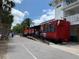 Ice cream parlor with a line of customers on a sunny day at 860 Virginia St # 303, Dunedin, FL 34698