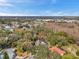 Wide aerial view of the property and surrounding neighborhood at 905 Linn Harbor Ct, Tarpon Springs, FL 34689