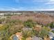 Aerial view showcasing home, landscape, and distant city view at 905 Linn Harbor Ct, Tarpon Springs, FL 34689