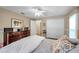 Bedroom with a queen bed and walk-in closet at 905 Linn Harbor Ct, Tarpon Springs, FL 34689