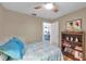 Charming bedroom with a view of the kitchen at 905 Linn Harbor Ct, Tarpon Springs, FL 34689