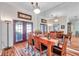 Elegant dining room with hardwood floors and a large mirror at 905 Linn Harbor Ct, Tarpon Springs, FL 34689