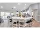 Spacious kitchen island with seating for four at 905 Linn Harbor Ct, Tarpon Springs, FL 34689