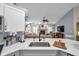 Kitchen with large island, sink and view of living room at 905 Linn Harbor Ct, Tarpon Springs, FL 34689