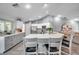 Gray kitchen cabinets with white quartz countertops at 905 Linn Harbor Ct, Tarpon Springs, FL 34689