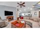 Living room with a fireplace and open floor plan at 905 Linn Harbor Ct, Tarpon Springs, FL 34689