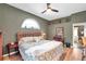 Main bedroom with ensuite bath and a desk area at 905 Linn Harbor Ct, Tarpon Springs, FL 34689