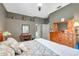 Main bedroom with ensuite bath and large dresser at 905 Linn Harbor Ct, Tarpon Springs, FL 34689