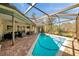 Screened-in pool and patio area, perfect for relaxation at 905 Linn Harbor Ct, Tarpon Springs, FL 34689