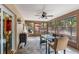 Enclosed patio featuring tiled floor, ceiling fan, and a view of the outdoors at 9445 Preston Rd, Brooksville, FL 34601