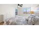 Bedroom with a queen bed, dresser, and water views at 9495 Blind Pass Rd # 605, St Pete Beach, FL 33706