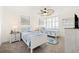 Guest bedroom with twin beds and coastal decor at 9495 Blind Pass Rd # 605, St Pete Beach, FL 33706