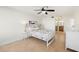 Bright bedroom with a full-size bed and ensuite bathroom at 9495 Blind Pass Rd # 605, St Pete Beach, FL 33706