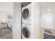 Convenient in-unit laundry with stackable washer and dryer at 9495 Blind Pass Rd # 605, St Pete Beach, FL 33706