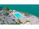 Aerial view of resort-style pool and marina at 9495 Blind Pass Rd # 605, St Pete Beach, FL 33706