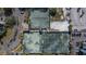 Aerial view of community tennis courts at 9495 Blind Pass Rd # 605, St Pete Beach, FL 33706