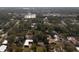 Wide aerial view showing neighborhood context and property location at 9810 Parsons St, Tampa, FL 33615