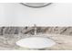 Close-up on bathroom with white cabinets and sink with chrome faucet with granite counters at 10340 Ventura Dr, Spring Hill, FL 34608