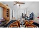 Bright bedroom with wood style floors, closet and natural light at 10340 Ventura Dr, Spring Hill, FL 34608