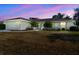 Charming single-story home with well-maintained landscaping, mature trees, and attached two car garage at 10340 Ventura Dr, Spring Hill, FL 34608