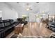 Bright and airy living room with open layout, hardwood floors, and comfortable seating at 10340 Ventura Dr, Spring Hill, FL 34608