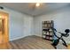 Bright bedroom with light wood flooring and neutral paint at 10800 Us Highway 19 N # 108, Pinellas Park, FL 33782