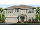 Charming two-story home with a two-car garage, decorative shutters, and lush landscaping at 10870 Gentle Current Way, Parrish, FL 34219