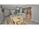 Open dining area with views of the living room and kitchen creating a spacious feel at 12341 79Th Pl, Seminole, FL 33772