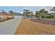 Charming single-story home featuring a well-manicured front yard and a two-car garage at 12341 79Th Pl, Seminole, FL 33772