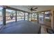This is the enclosed sunroom with hot tub and pool view at 12341 79Th Pl, Seminole, FL 33772