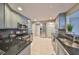 Updated kitchen featuring sleek appliances, custom cabinets, and granite counters for a modern touch at 12341 79Th Pl, Seminole, FL 33772