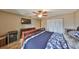 Main bedroom suite featuring ceiling fan and natural light at 12341 79Th Pl, Seminole, FL 33772