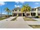 Beautiful multi-Gathering home with palm trees and three car garage at 12973 Dream Catcher Way, Riverview, FL 33579