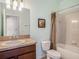 Cozy bathroom features a shower-tub combo, single sink vanity, and neutral decor at 13192 Royal Pines Ave, Riverview, FL 33579